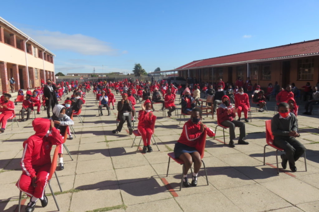 The learners from E.A. Janari celebrating the opening of their library