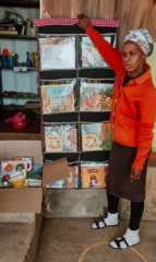 The practitioner with the hanging library for her Centre