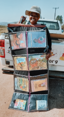The practitioner with the hanging library for her Centre