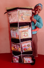 The practitioner with the hanging library for her Centre