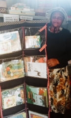 The practitioner with the hanging library for her Centre