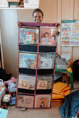 The practitioner with the hanging library for her Centre
