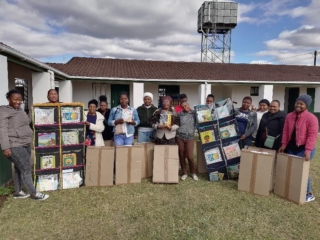 Practitioners from Zero2Five receiving their donation of resources
