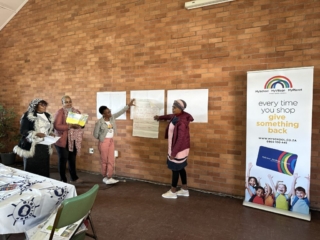 Teachers presenting their groupwork at the workshop