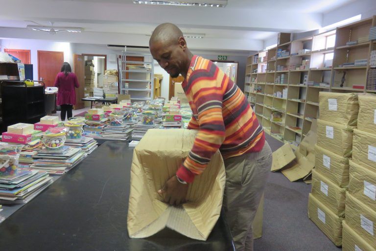 Our General Assistant, ensuring that the books are securely packaged