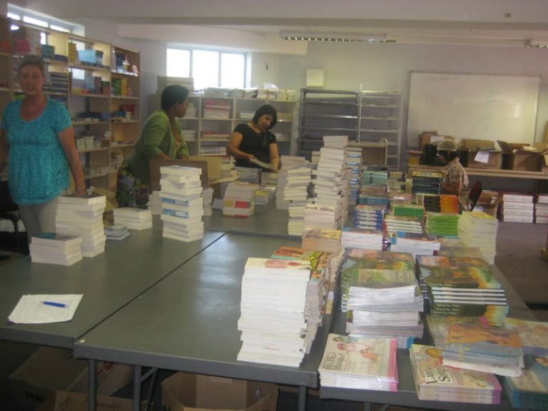 Our staff selecting books for packing