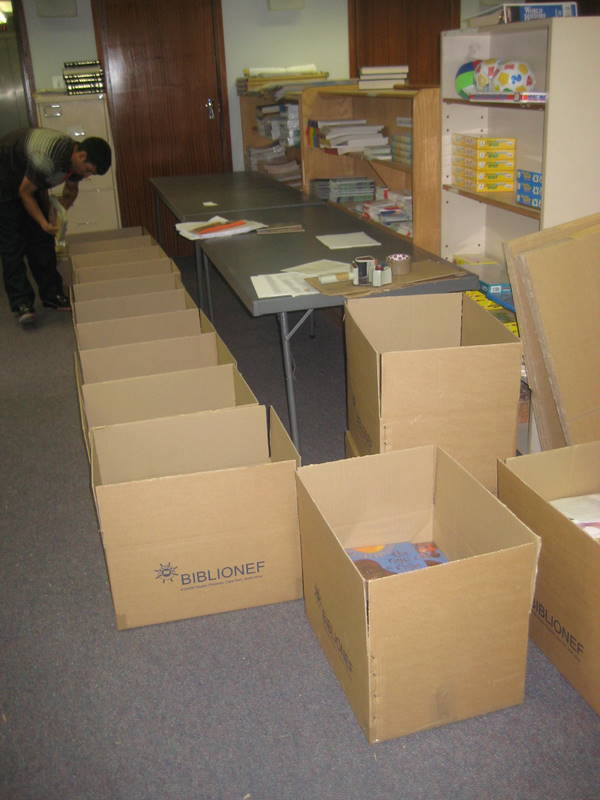 Packing books for our beneficiaries